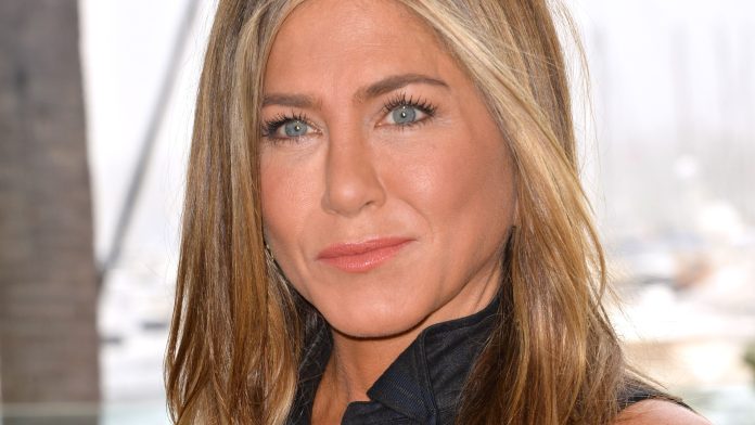 Jennifer Aniston Interrupted By Dog While Showing Off Toned Arms
